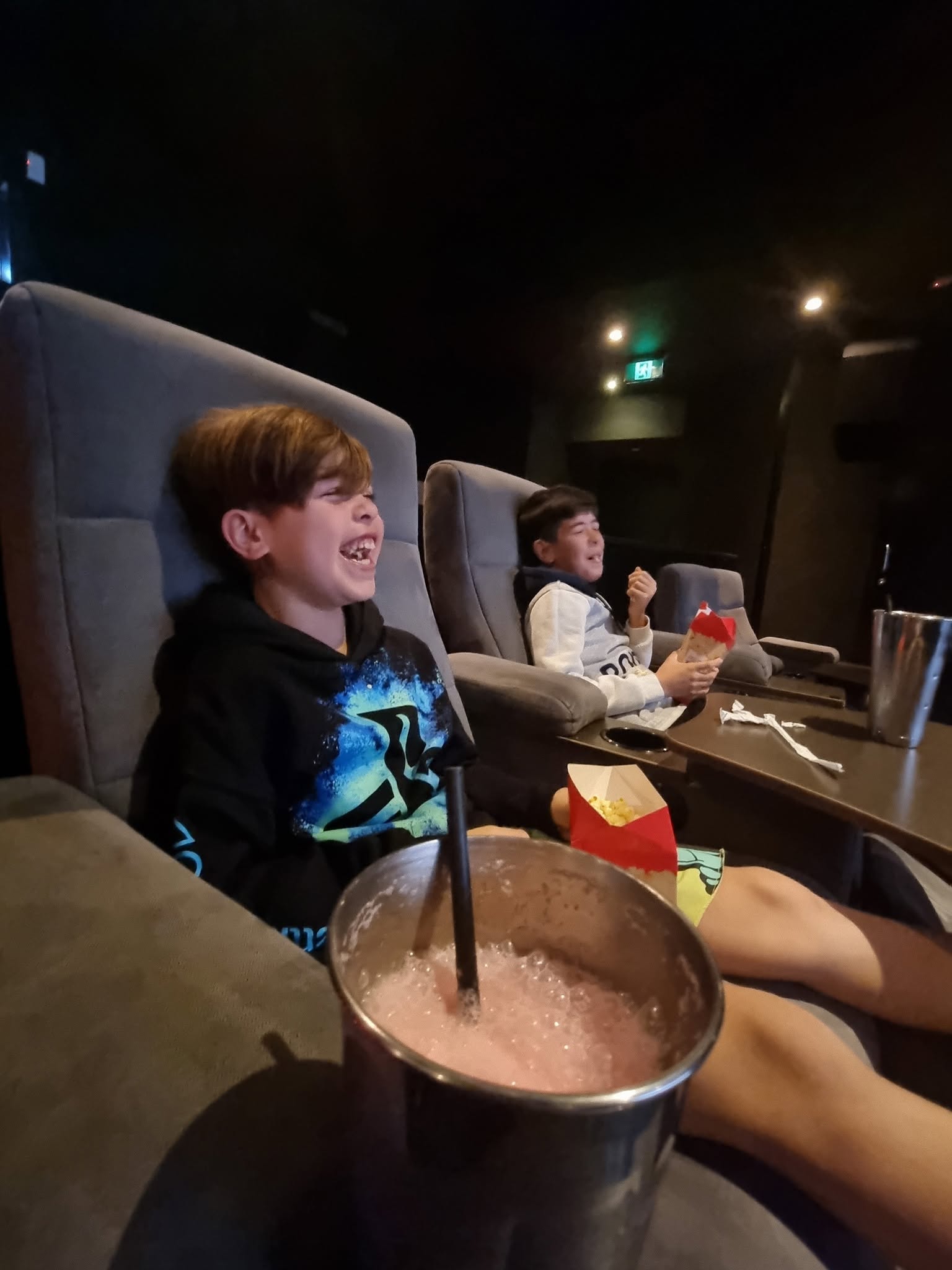 kids laughing at cinema