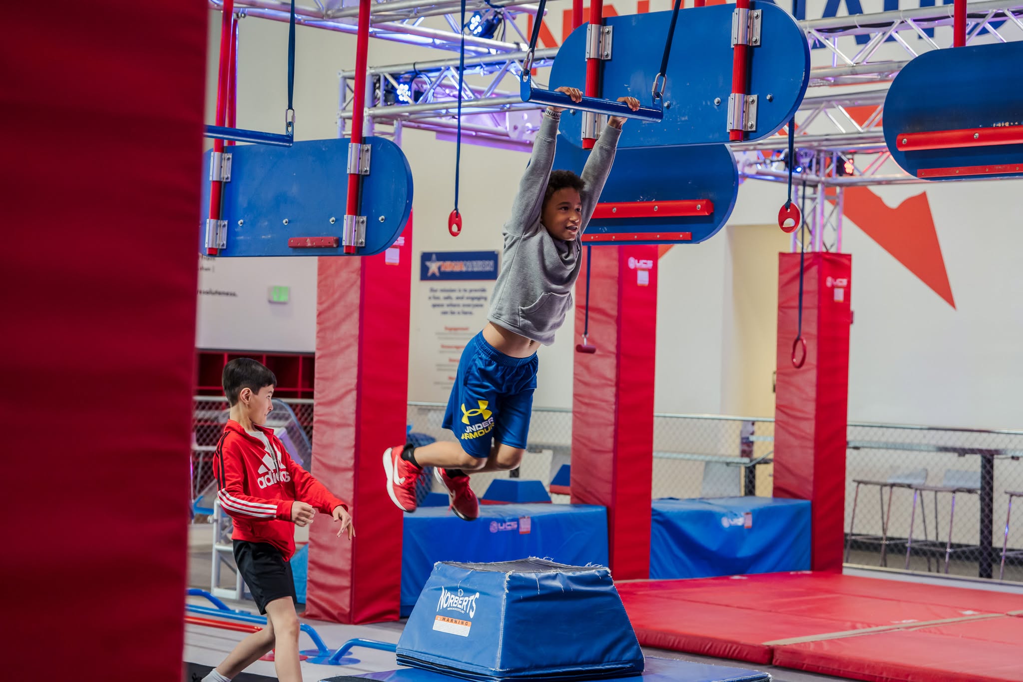 kids swinging at gym
