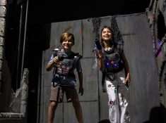 two kids with laser gun
